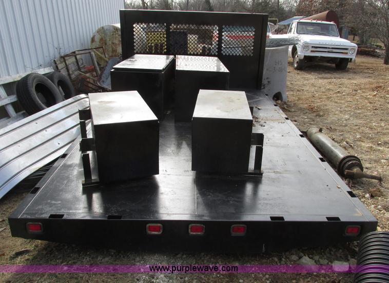 image for item F4220 12.5' flatbed with dump hoist