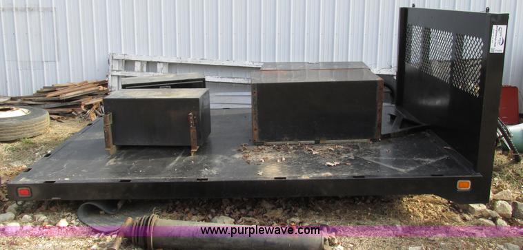 image for item F4220 12.5' flatbed with dump hoist