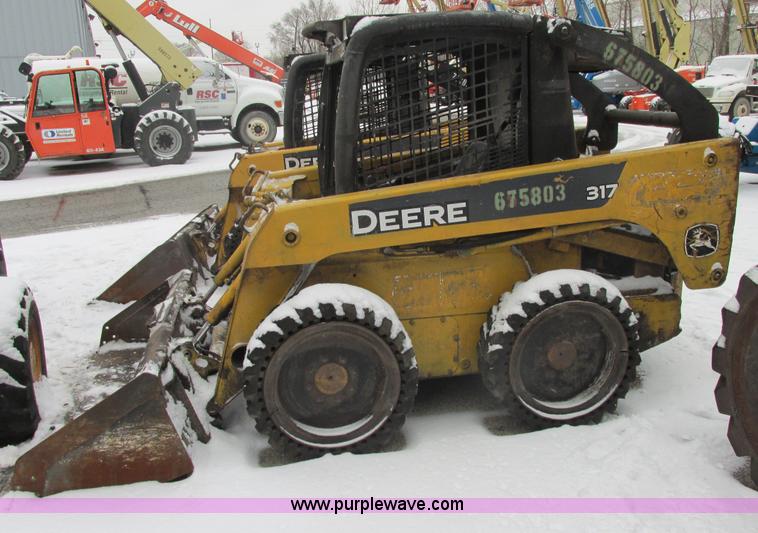 image for item AB9486 2004 John Deere 317 skid steer
