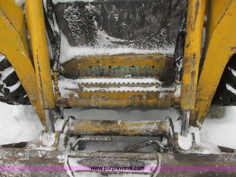 image for item AB9486 2004 John Deere 317 skid steer