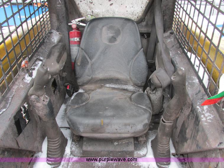 image for item AB9486 2004 John Deere 317 skid steer