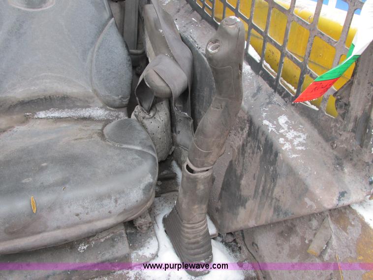 image for item AB9486 2004 John Deere 317 skid steer