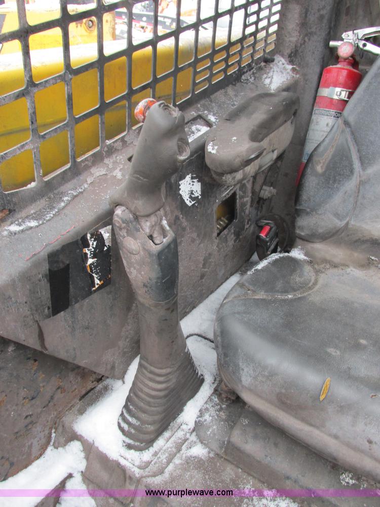 image for item AB9486 2004 John Deere 317 skid steer