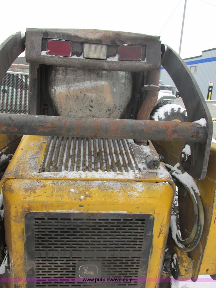 image for item AB9486 2004 John Deere 317 skid steer