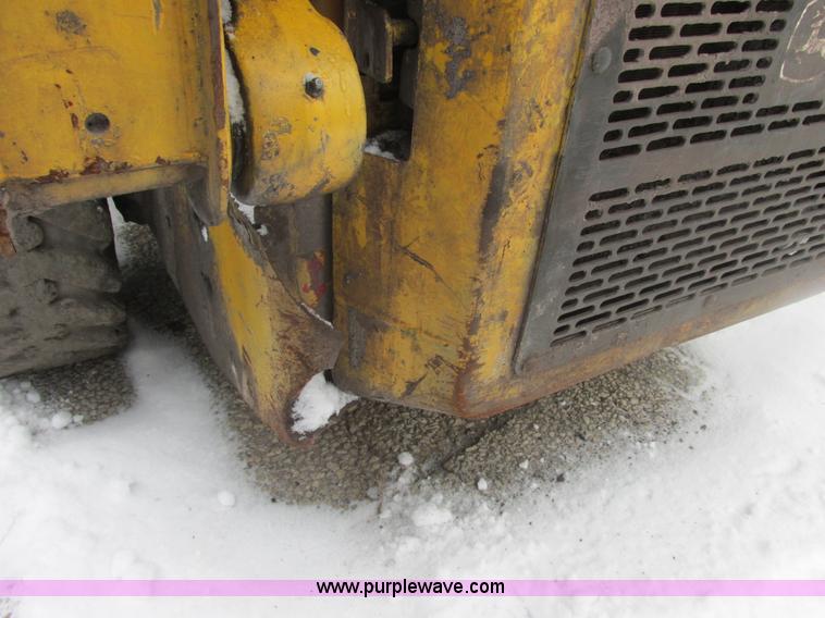 image for item AB9486 2004 John Deere 317 skid steer