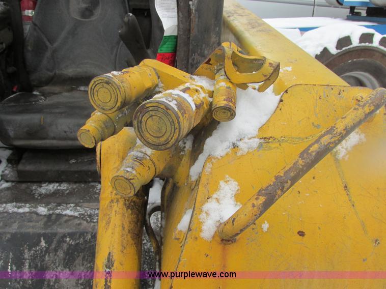 image for item AB9486 2004 John Deere 317 skid steer