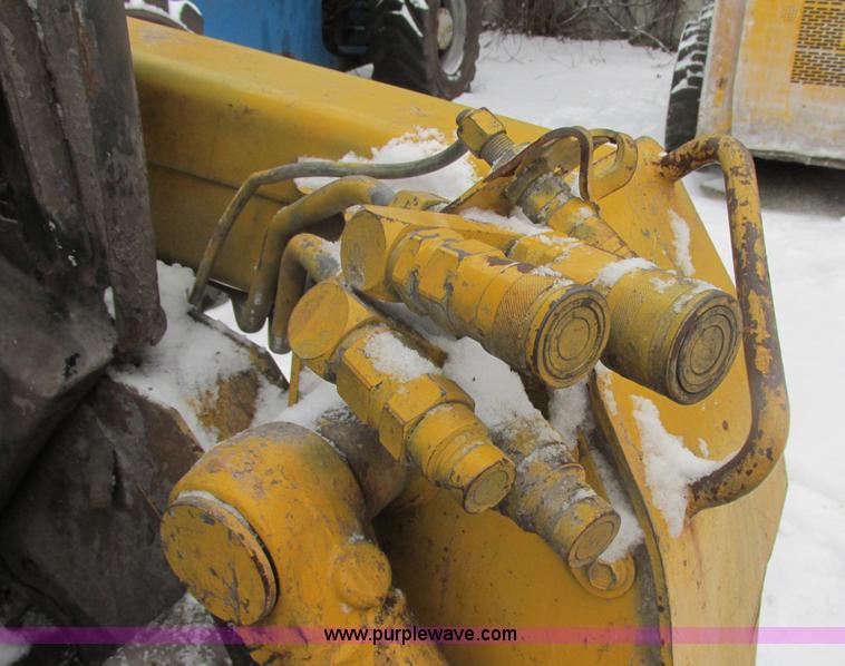 image for item AB9486 2004 John Deere 317 skid steer