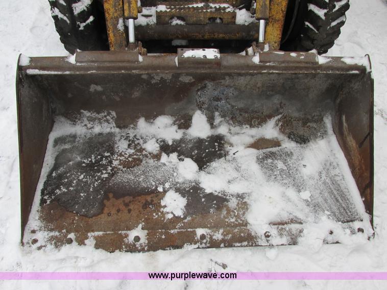 image for item AB9487 2005 John Deere 317 skid steer