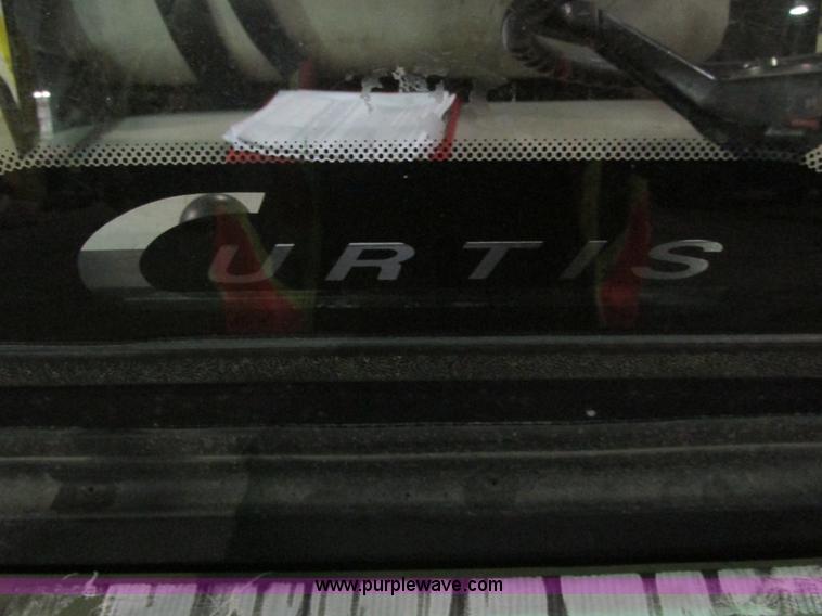 image for item AB9489 2007 E-Z-GO STS 4x4 UTV