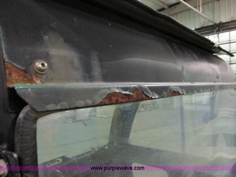 image for item AB9489 2007 E-Z-GO STS 4x4 UTV