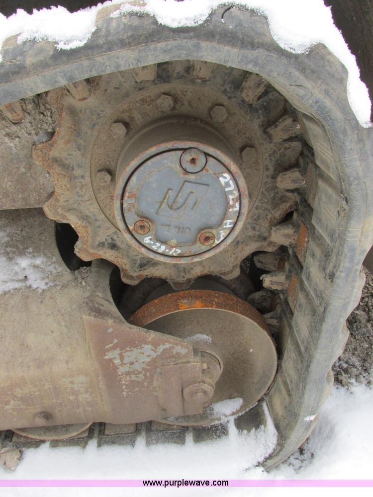 image for item E7067 2004 Takeuchi TL140 skid steer