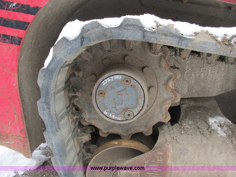 image for item E7067 2004 Takeuchi TL140 skid steer