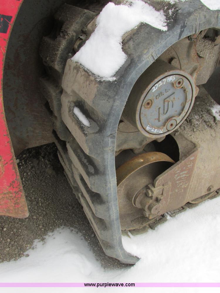 image for item E7067 2004 Takeuchi TL140 skid steer