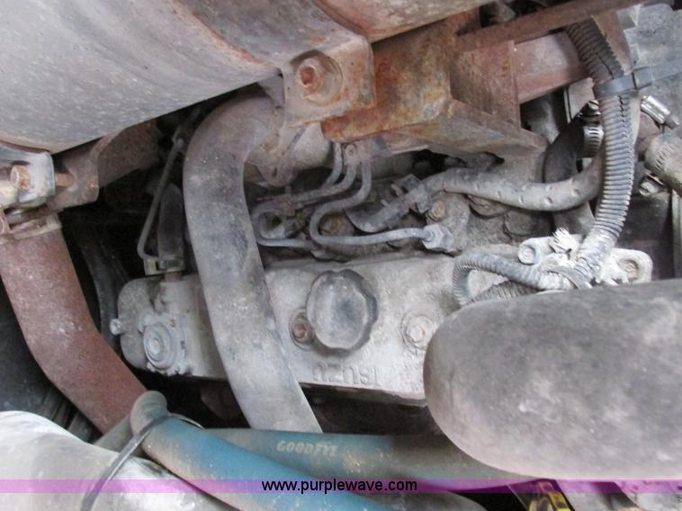 image for item E7067 2004 Takeuchi TL140 skid steer