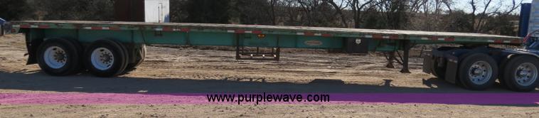 image for item B4561 1990 Fontaine extendable flatbed trailer