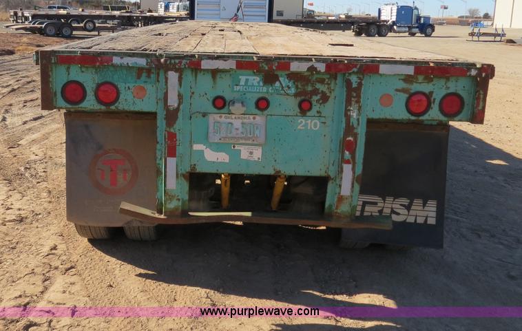 image for item B4561 1990 Fontaine extendable flatbed trailer