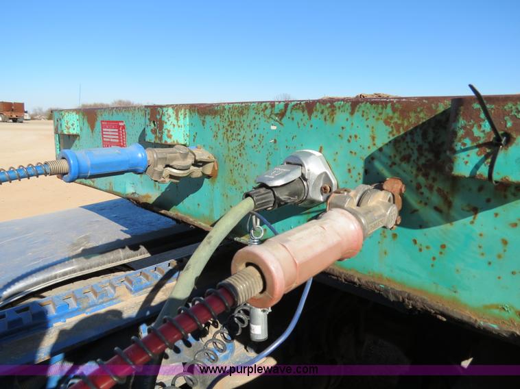 image for item B4561 1990 Fontaine extendable flatbed trailer