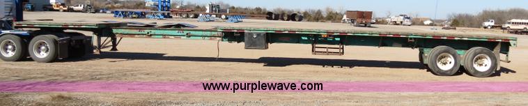 image for item B4561 1990 Fontaine extendable flatbed trailer