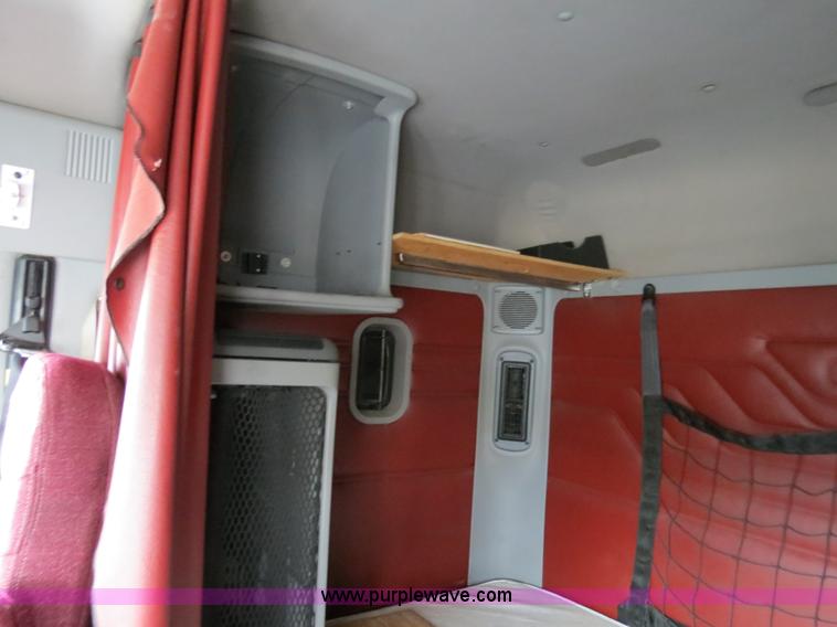 image for item B4570 2003 Freightliner ST120 semi truck