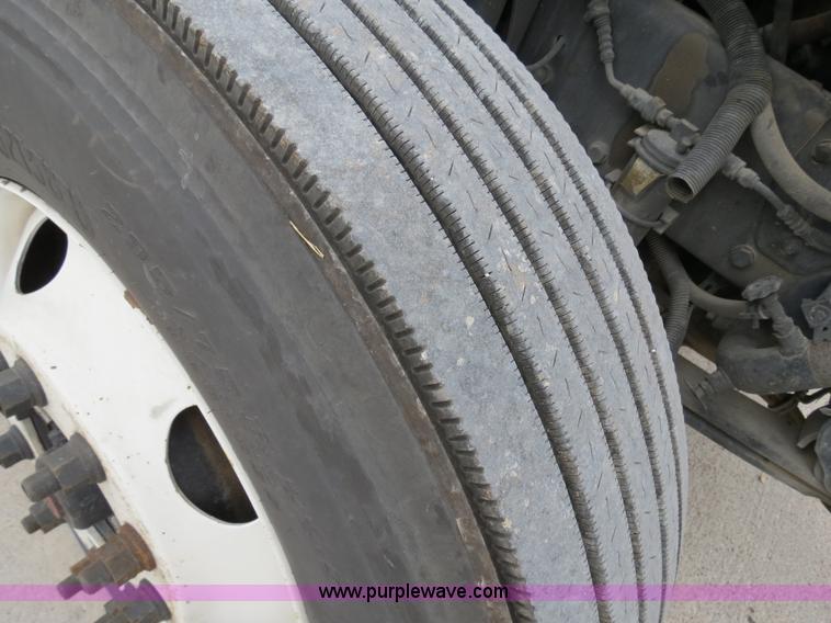 image for item B4570 2003 Freightliner ST120 semi truck