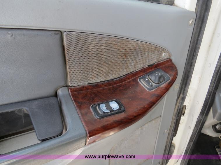 image for item B4603 2003 Freightliner ST120 semi truck