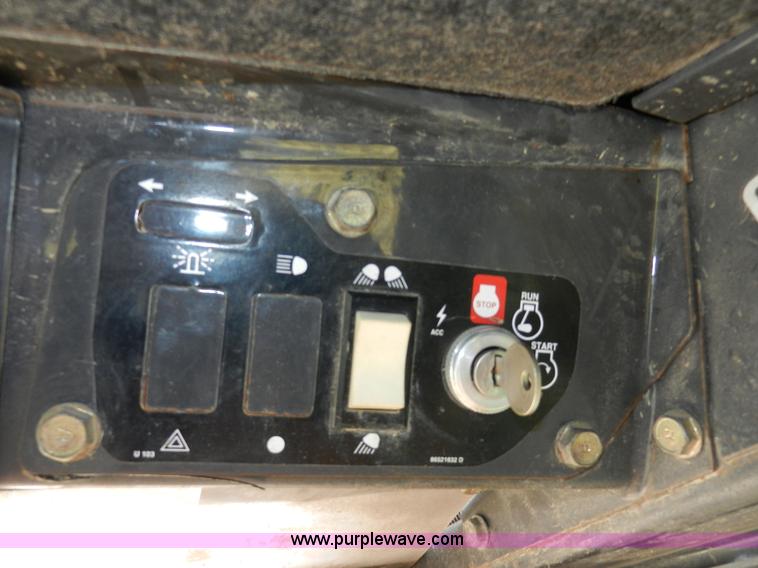 image for item AB9597 New Holland LS180 skid steer