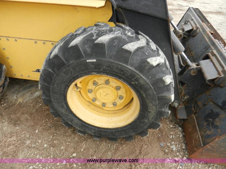 image for item AB9597 New Holland LS180 skid steer