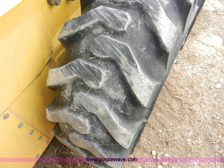 image for item AB9597 New Holland LS180 skid steer