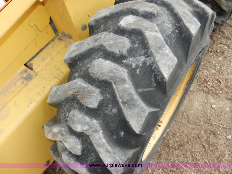 image for item AB9597 New Holland LS180 skid steer