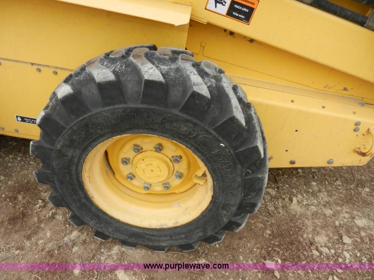 image for item AB9597 New Holland LS180 skid steer