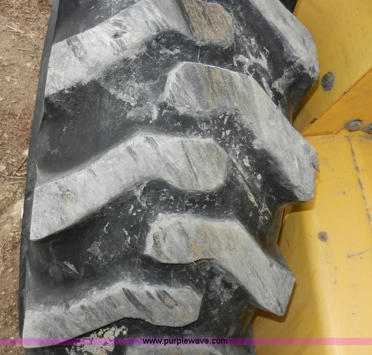 image for item AB9597 New Holland LS180 skid steer