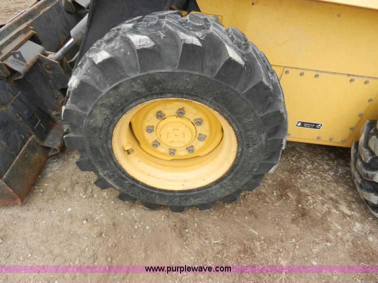 image for item AB9597 New Holland LS180 skid steer