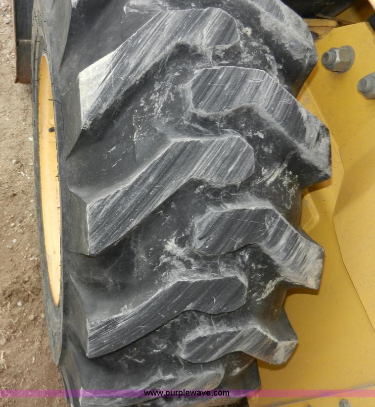 image for item AB9597 New Holland LS180 skid steer