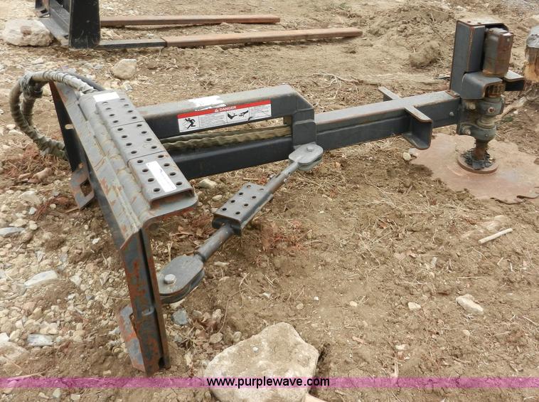 image for item AB9599 Brown brush saw skid steer attachment