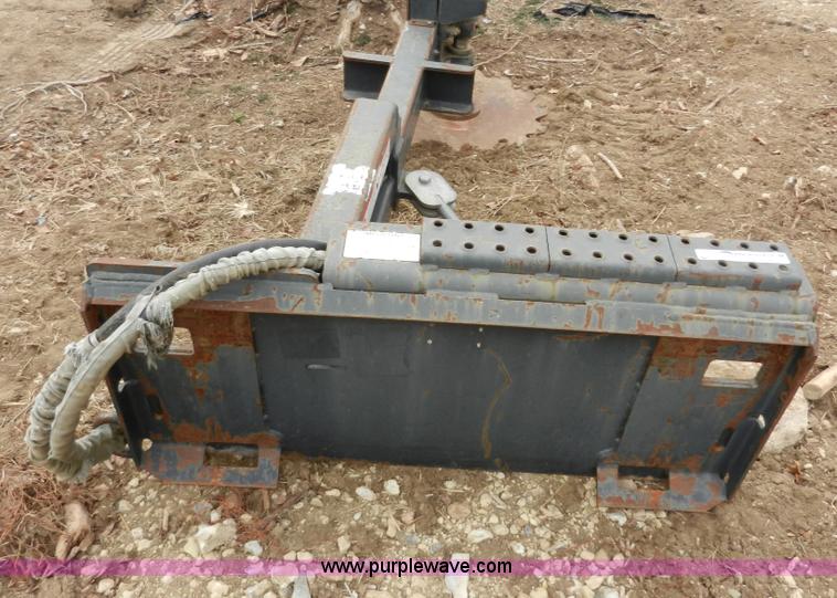 image for item AB9599 Brown brush saw skid steer attachment