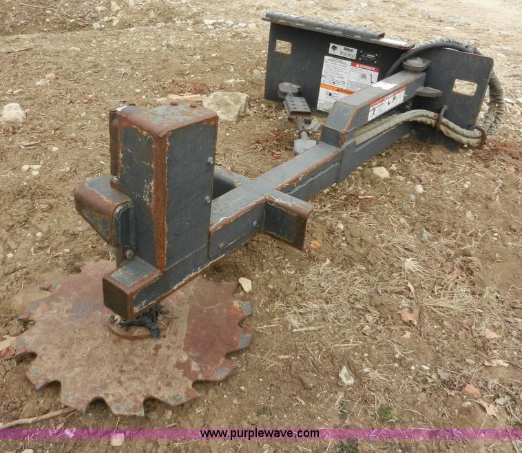 image for item AB9599 Brown brush saw skid steer attachment