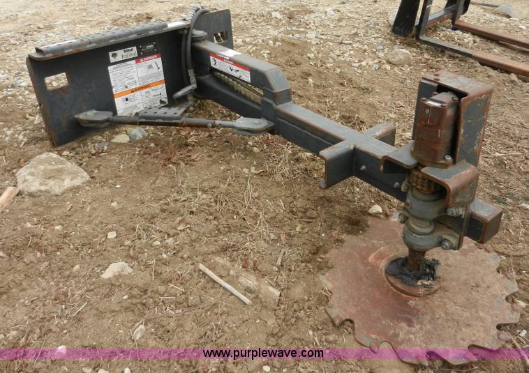 image for item AB9599 Brown brush saw skid steer attachment