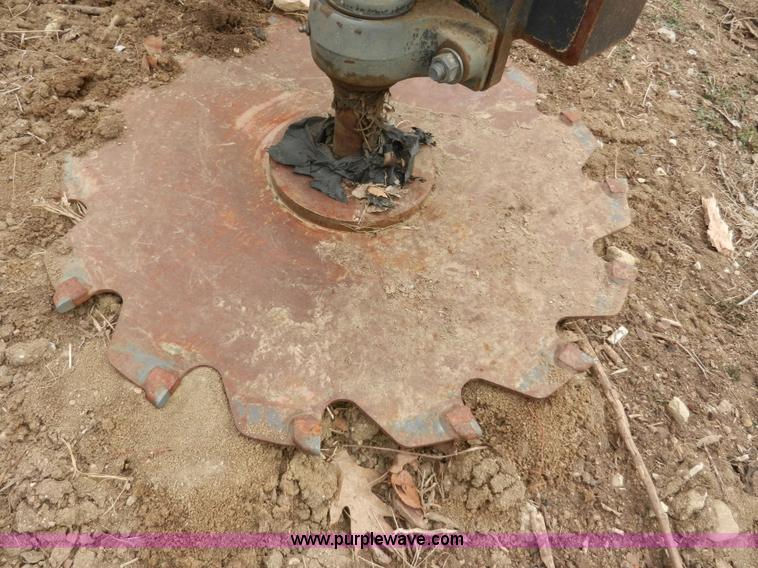 image for item AB9599 Brown brush saw skid steer attachment