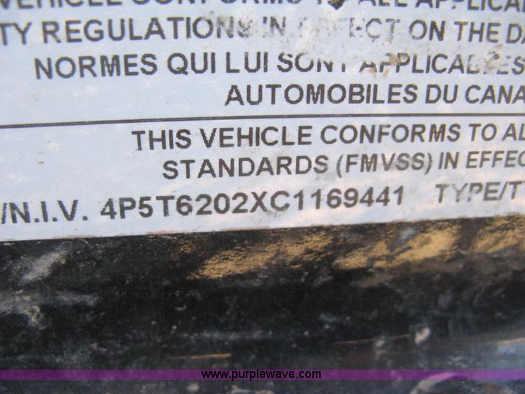 image for item B8420 2012 PJ tandem axle tilt deck flatbed trailer