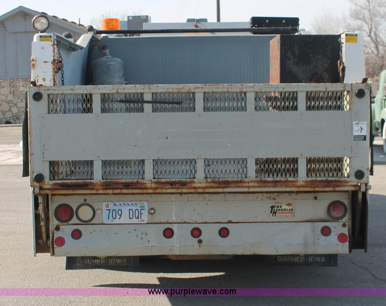 image for item E2542 1999 Ford F350 Super Duty tire service truck