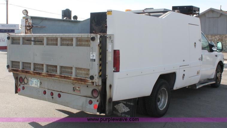 image for item E2542 1999 Ford F350 Super Duty tire service truck