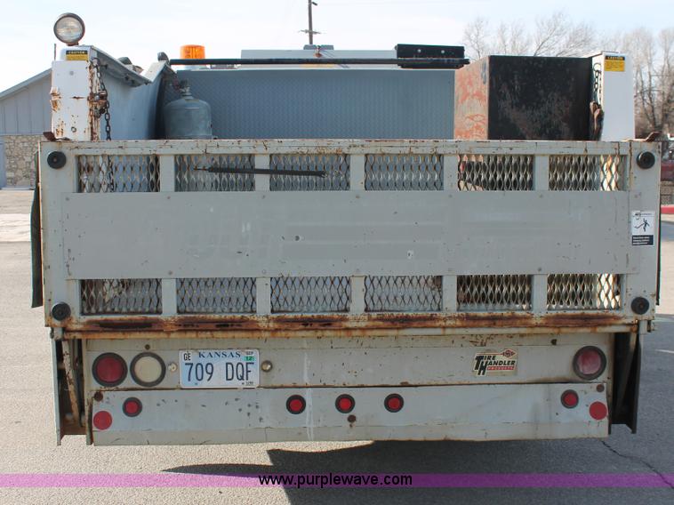 image for item E2542 1999 Ford F350 Super Duty tire service truck