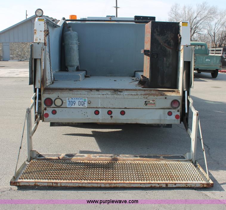 image for item E2542 1999 Ford F350 Super Duty tire service truck