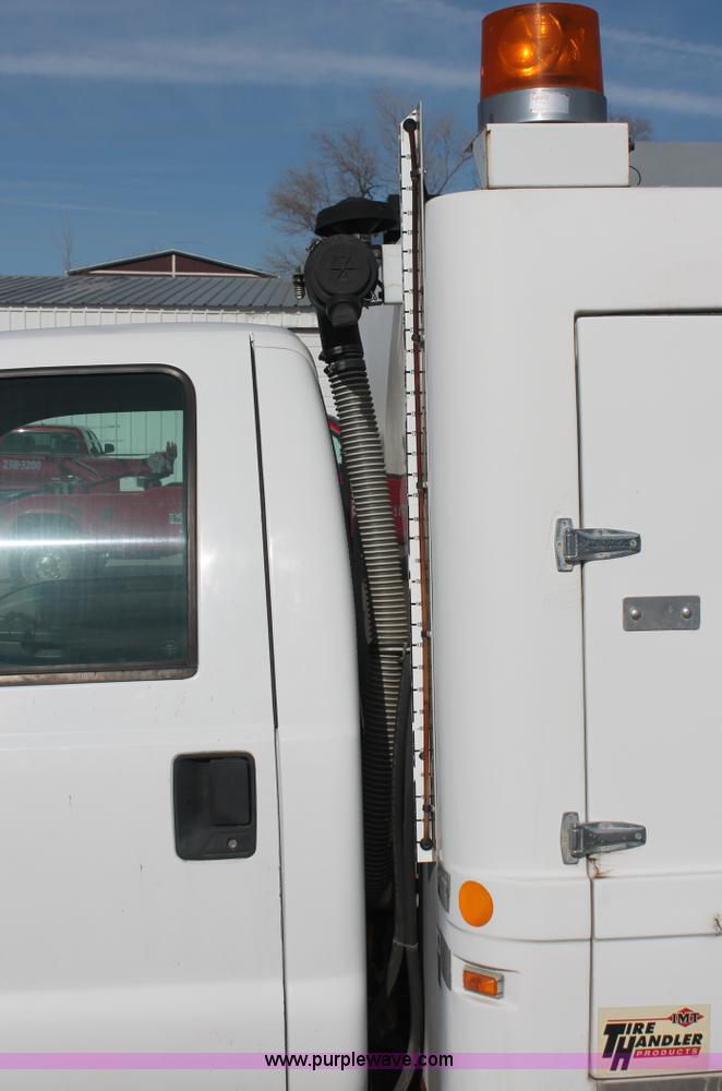 image for item E2542 1999 Ford F350 Super Duty tire service truck