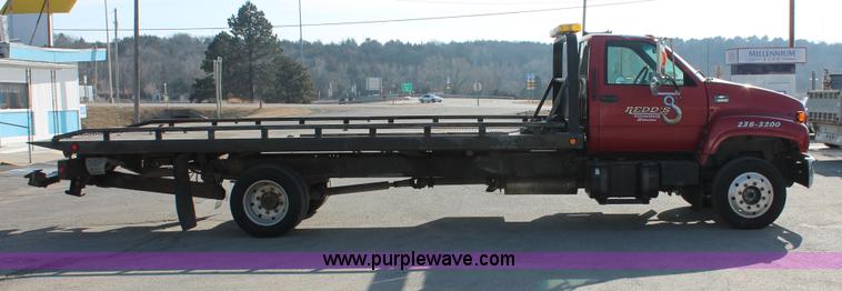 image for item E2547 2001 Chevrolet C6500 rollback truck