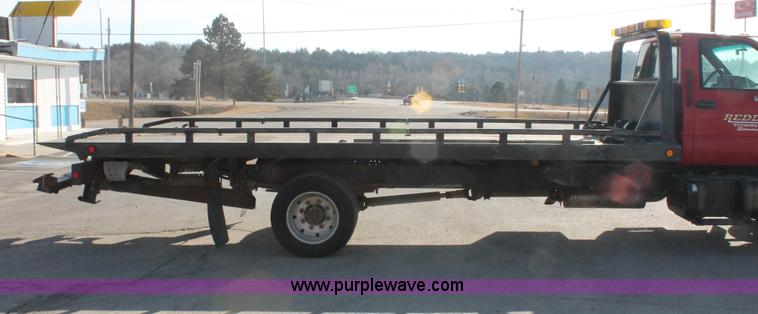 image for item E2547 2001 Chevrolet C6500 rollback truck