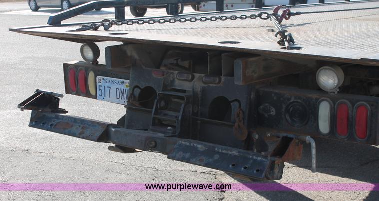 image for item E2547 2001 Chevrolet C6500 rollback truck