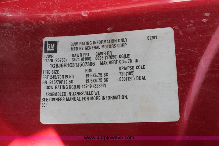 image for item E2547 2001 Chevrolet C6500 rollback truck