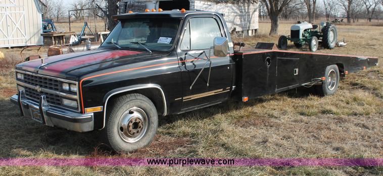 image for item E2552 1983 Chevrolet Silverado 30 car hauler truck