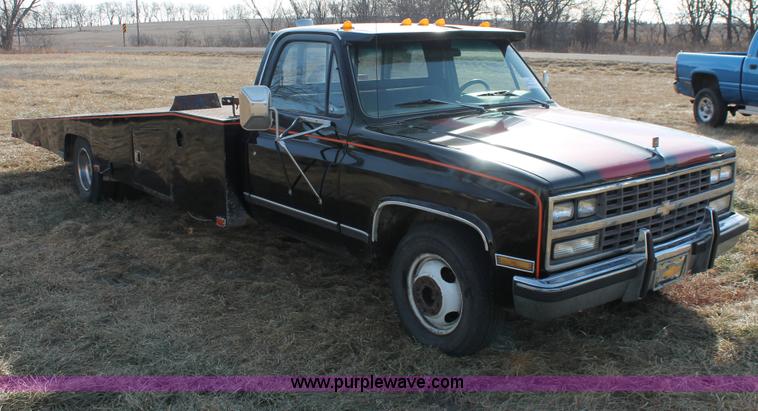 image for item E2552 1983 Chevrolet Silverado 30 car hauler truck